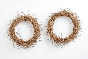 Two Natural Straw Wreaths on a White Background photo