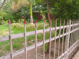 iron fence outside the park photo