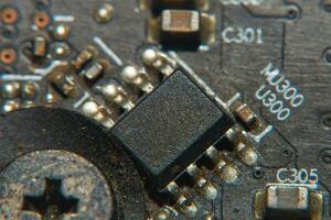 a close up of a circuit board with a small electronic device photo