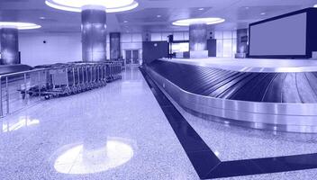 Baggage claim area in airport photo