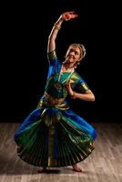 Beautiful dancer of Indian dance Bharatanatyam photo