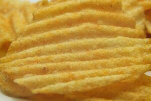 Macro close up view of Potato chips photo