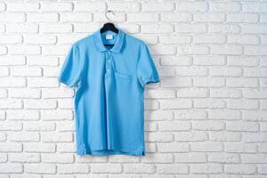 Blue cotton polo t-shirt texture close up photo