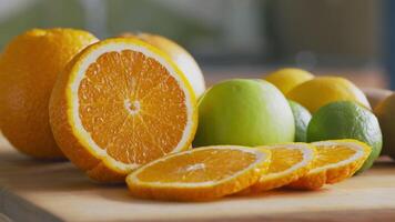 Healthy lifestyle concept. Fruits assortment on kitchen table, close up video