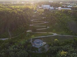 Aerial top vew of winding road in the city photo