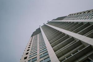 A tall hotel building standing majestically against the skyline photo