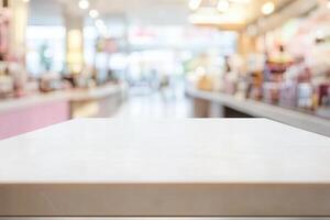 Blurred cafe interior with a focus on a table surface. photo