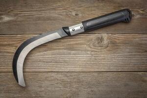 brush clearing sickle with carbon steel blade photo