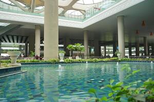 the indoor pool at the at the new yogyakarta international airport photo