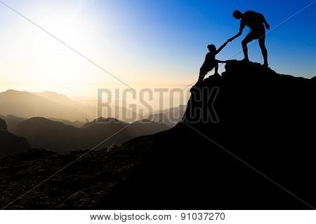 Teamwork Couple Hiking Helping Hand