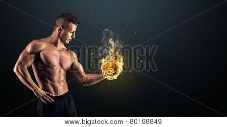 Muscular Man With Dumbbells On Black Background