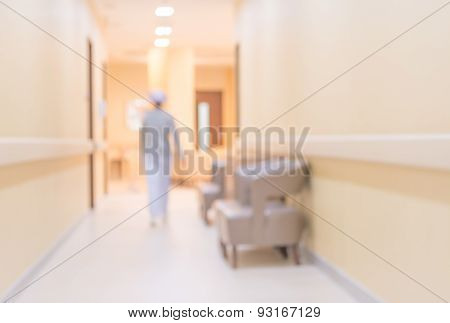 Blur Image Of Nurse In Hospital Walkway