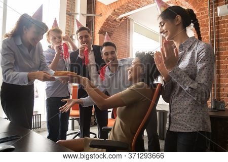 Happy African American Businesswoman Receiving Cake From Smiling Colleagues