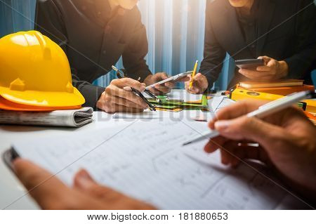 Teamwork Of Business Man Contractor Working Meeting In The Office Construction Site On Their Archite