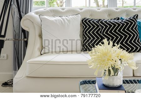 Luxury White Sofa In Living Room With Yellow Flower In Vase