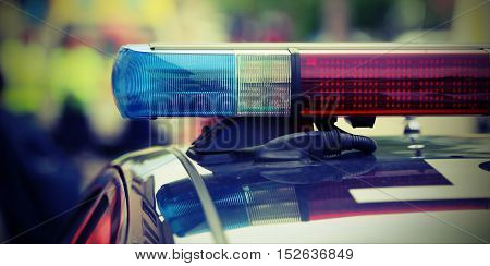 Red And Blue Flashing Lights Of The Police Car At The Checkpoint