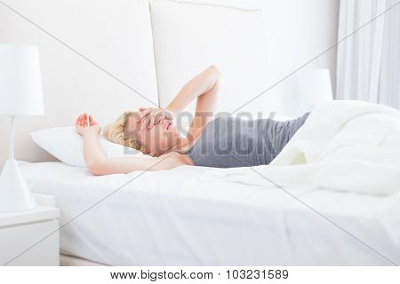 Young beautiful woman refuses to wake up.