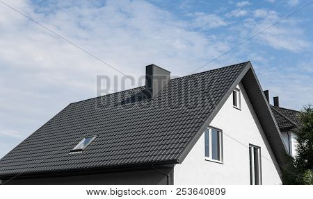 Modern Roof Covered With Tile Effect Pvc Coated Brown Metal Roof Sheets.