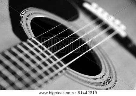 Closeup detail of guitar strings for playing music