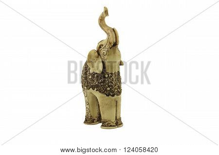 Carved statuette of indian elephant  with beautiful ornate pattern. Made of the ivory in Sri Lanka. Isolated on white. Front view of statuette.