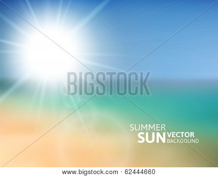 Blurry beach and blue sky with summer sun