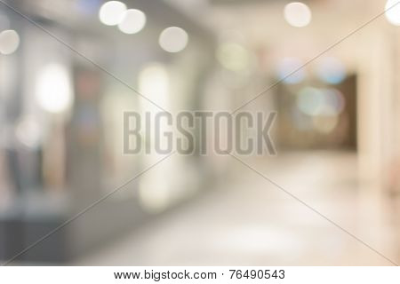 Abstract urban background with blurred buildings and street, shallow depth of focus.