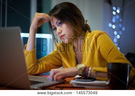 Pensive Girl College Student Studying At Night