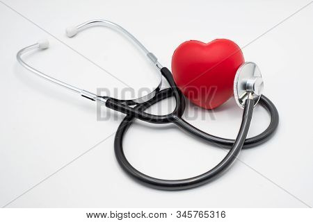 Medical Stethoscope And Red Heart On The White Background.medical Concepts, Medical Devices For Trea