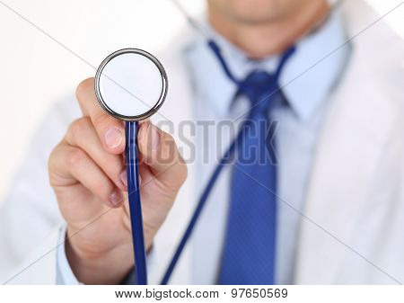 Male Medicine Doctor Hand Holding Stethoscope Head