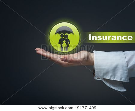 Business Insurance Concept. Man Holding A Symbol Of Life Insurance And Health Insurance Rights.