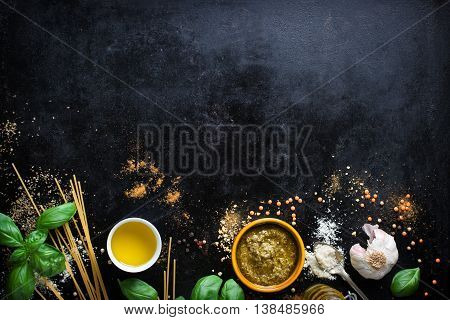 Food frame italian food background healthy food concept or ingredients for cooking pesto sauce on a vintage background top view with copy space