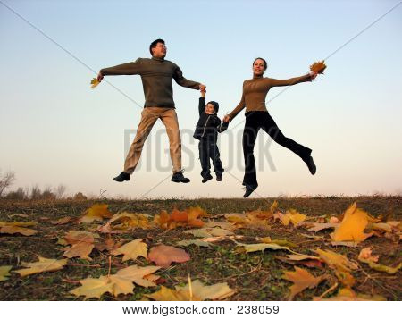 Fly Happy Family With Autumn Leaves