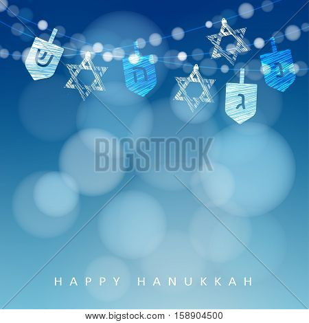 Hanukkah blue background with string of lights, dreidels and jewish stars. Festive party decoration. Modern blurred vector illustration for Jewish Festival of light.