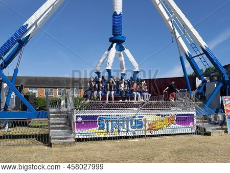 Grantham, Lincolnshire, England- July 9, 2022. People At The Stratos Fear Ride.