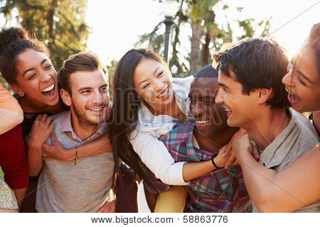 Group Of Friends Having Fun Together Outdoors