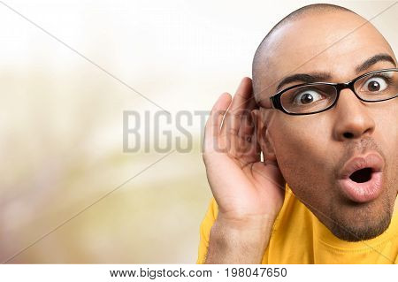 Man hand listening listen ear copy space man face