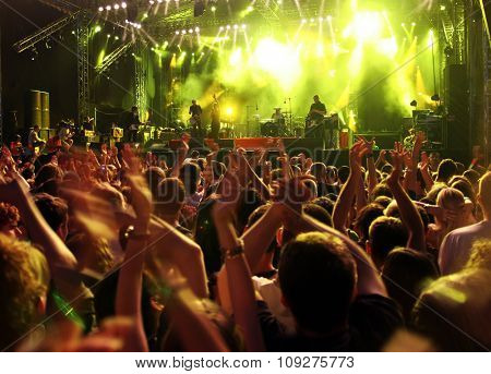 Band at a rock concert. Blur crowd