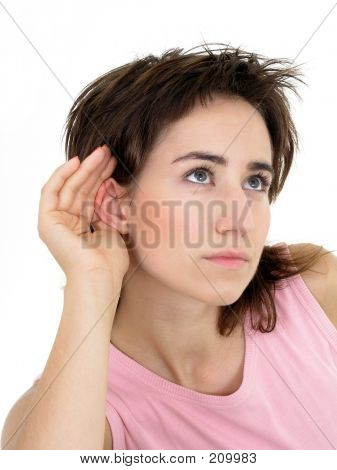 Woman With Hand To Ear Listening