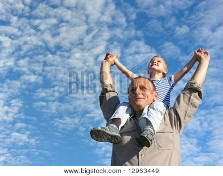 grandfather with grandson under cloudfield