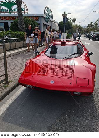 San Remo, Italy - August 8, 2021: Red Lancia Stratos Hf Rally Italian Sports Car Parked In The Stree