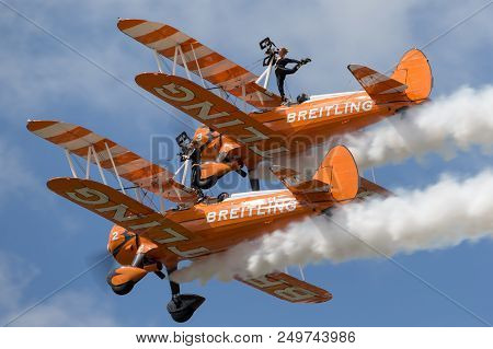 Raf Fairford, Gloucestershire, Uk - July 14, 2014: Breitling Wing Walkers Boeing Stearman Biplanes F