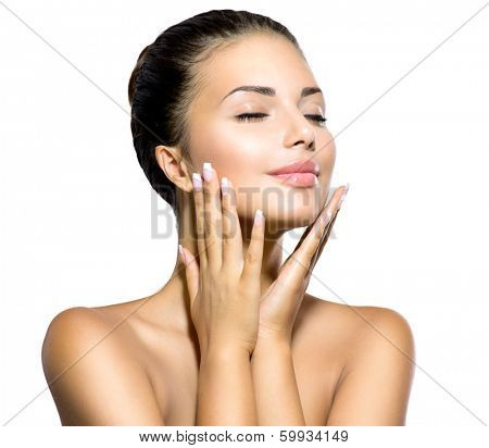 Beauty Spa Woman Portrait. Beautiful Girl Touching her Face. Perfect Fresh Skin. Pure Beauty Model Girl. Youth and Skin Care Concept. Pampering Skin. Health Care concept. Isolated on white background