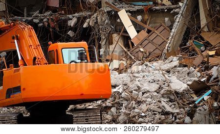 Destroyed Building Industrial. Building Demolition By Explosion. Abandoned Concrete Building With Ru