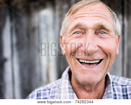 Happy smiling elder senior man portrait