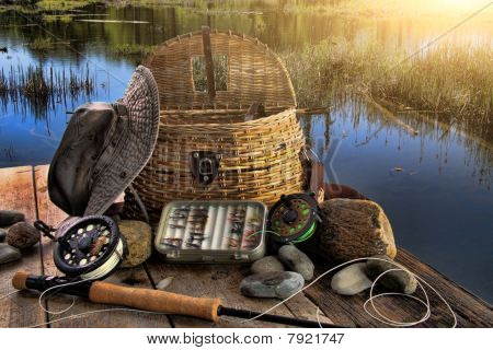 Traditional Fly-fishing Rod With Equipment In Late Afternoon