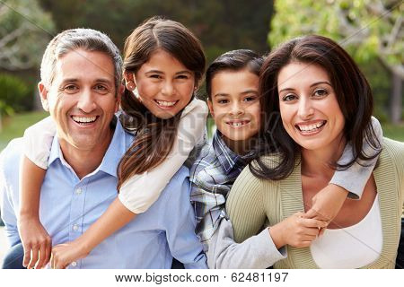 Portrait Of Hispanic Family In Countryside