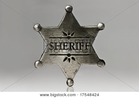 sheriff star isolated on black