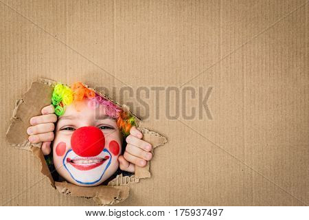 Funny Kid Clown Playing Indoor