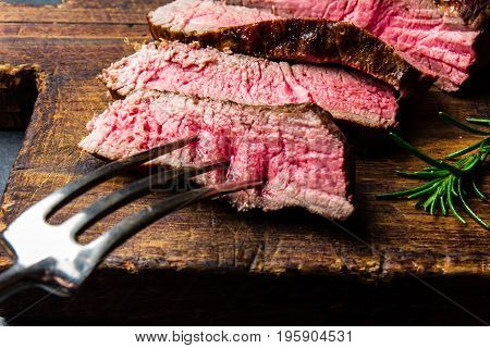 Sliced Grilled Medium Rare Beef Steak Served On Wooden Board Barbecue, Bbq Meat Beef Tenderloin. Top