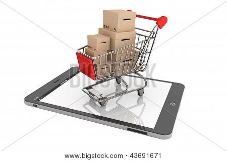 Shopping Cart With Boxes Over Tablet Pc